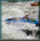 Canoeman running Bailey's Rapid on the Main Salmon River, Idaho