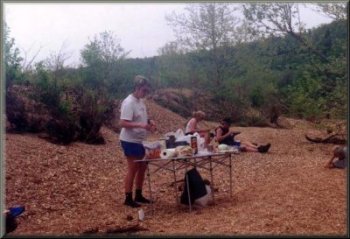 Carol helps prepare dinner after the first day on the river
