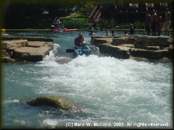 Kirk and Pam canoeing the slide at Rio Vista Dam