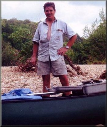 Marc McCord loads his boat to begin the trip