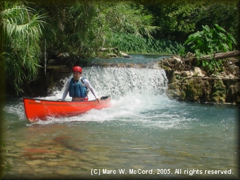 Tom Taylor showing how to keep a dry canoe at Cape Falls