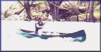Marc running Dogleg Rapid on the Upper Guad in winter, 1998